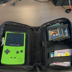 Nintendo Game Boy Color, with games and case.